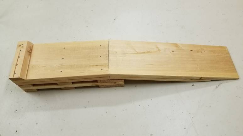 A piece of wood

Description generated with high confidence